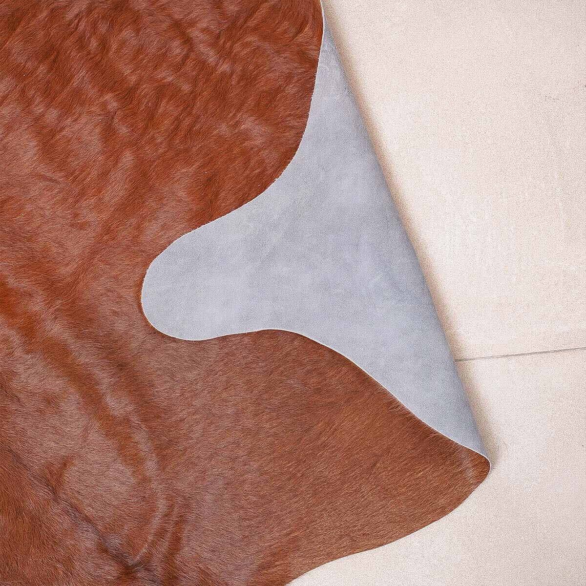 Brown Cowhide Rug – 4' x 5'