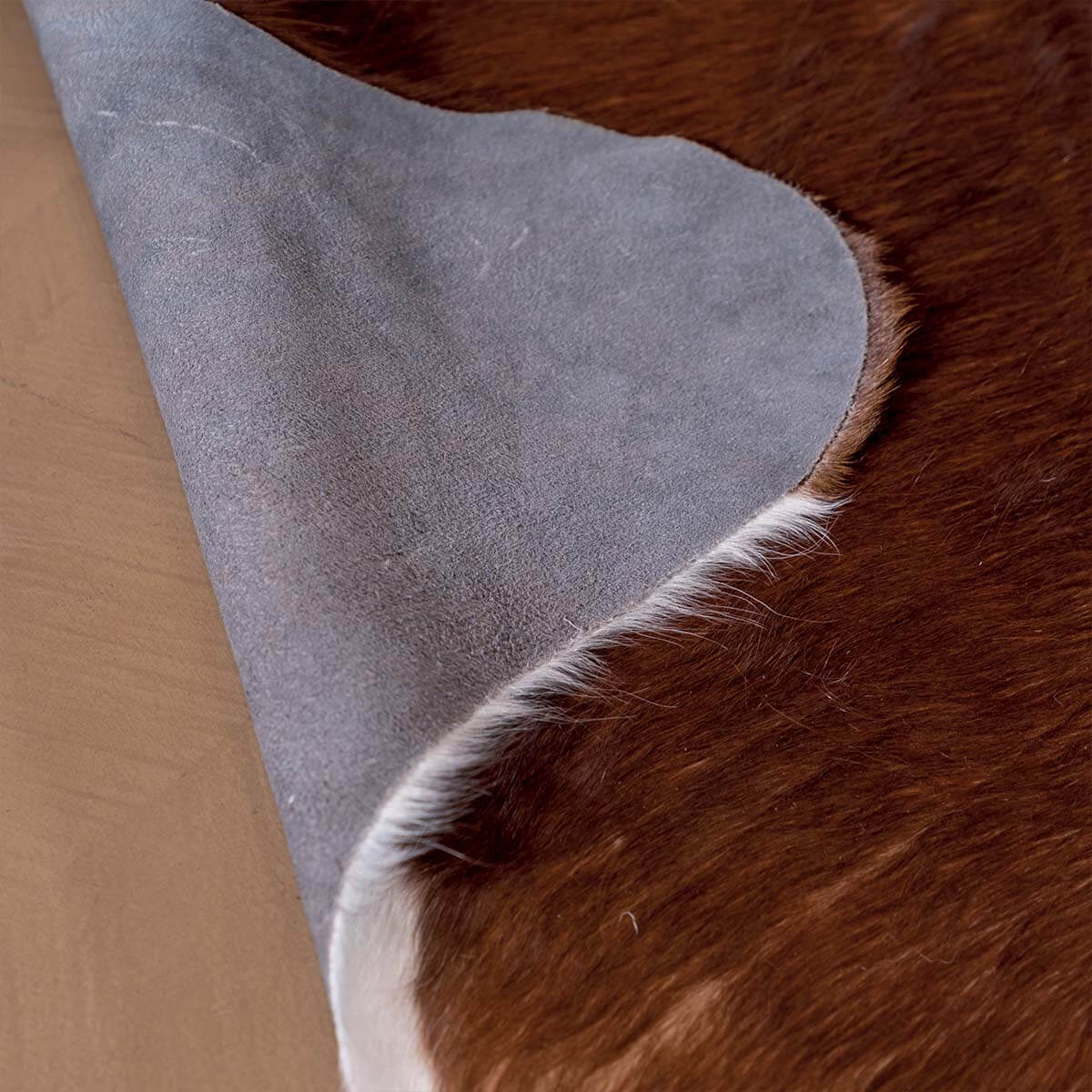 Brown & White Cowhide Rug – 5' x 5'